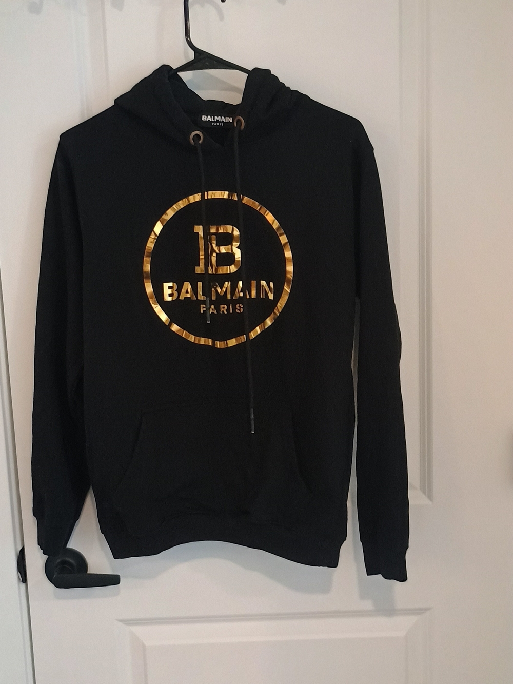 Balmain Black Hoodie with Gold Logo Circle
